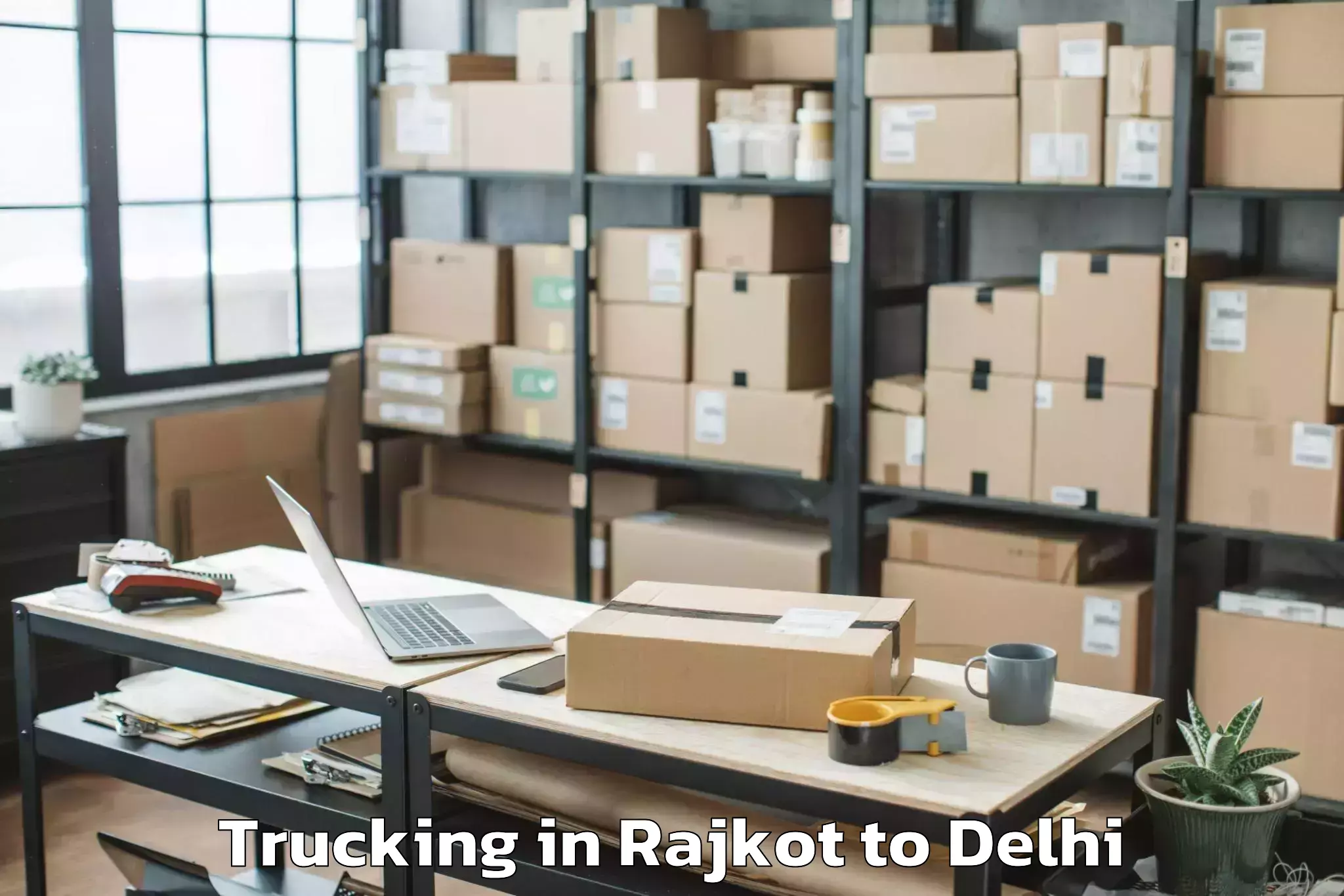 Affordable Rajkot to Seema Puri Trucking